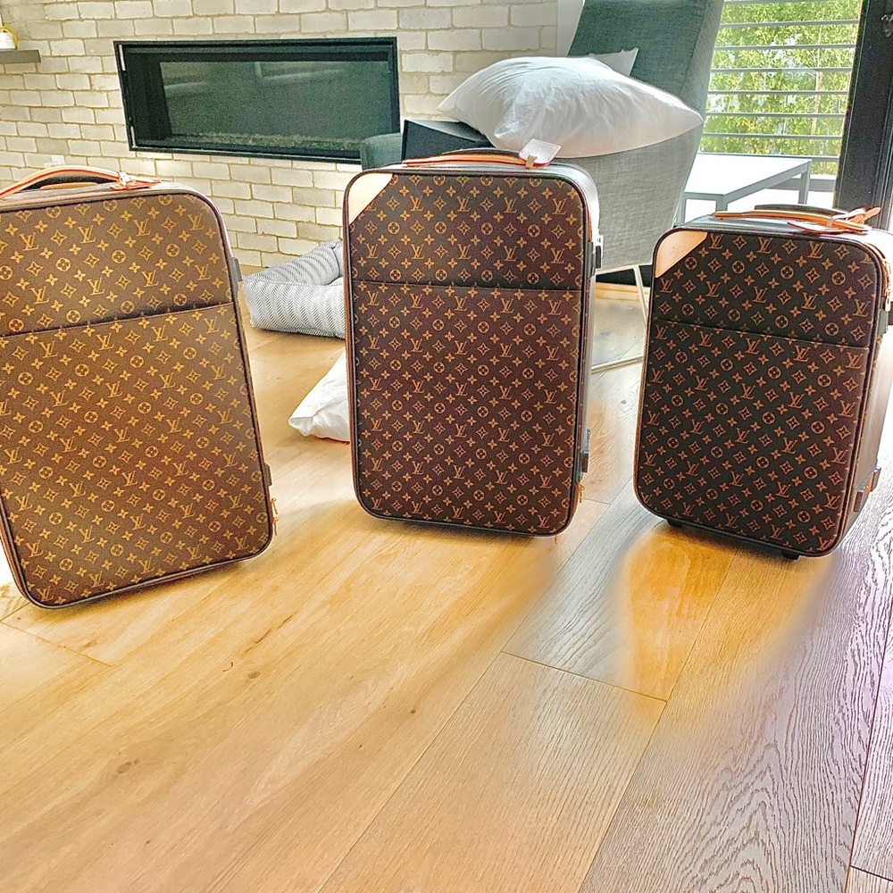 Louis Vuitton luggage with roller